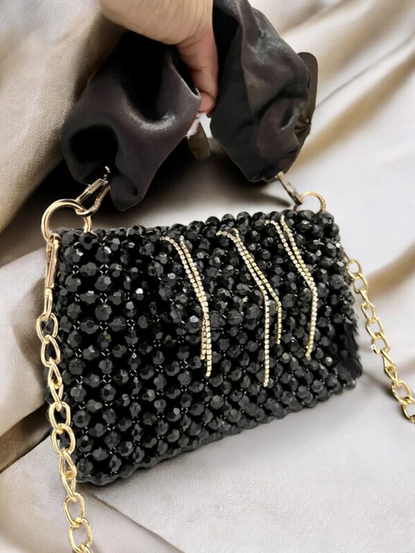 Nightshade Noir Clutch